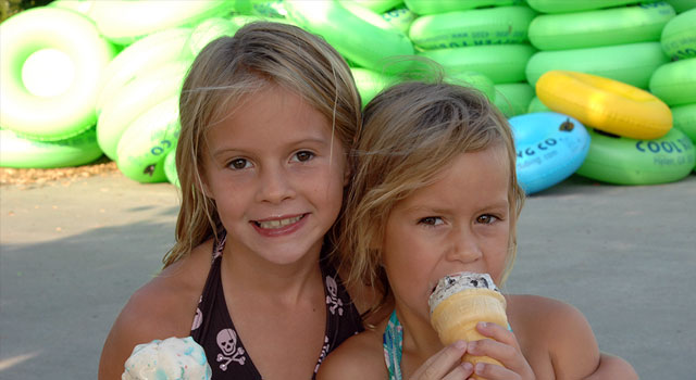 Two girls eating ice cream