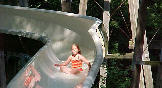 Child on water slide